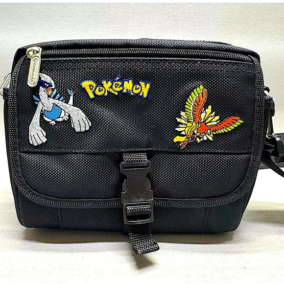 Pokemon Vintage Gameboy Game Carrying Case
Nintendo Authentic W/ Crossbody Strap - Picture 2 of 14